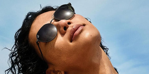 South Korean rapper Tarzzan of AllDay Project was seen wearing dark rutheniu, Maui Jim Kaulana AF GS627-17 round sunglasses in a GQ Korea feature, May 2024.