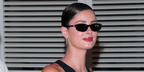 Taylor Hill was seen wearing black Miu Miu MU A06S 16K08Z sunglasses at Hotel Martinez, during Cannes Film Festival 2026.