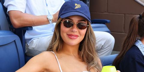 Dancer and digital creator Tessa Brooks was seen wearing gold and dark tortoiseshell Gucci GG1980S 002 oval sunglasses with brown lenses at the US Open 2025.
