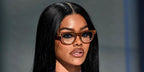 Teyana Taylor was seen wearing caramel Ray-Ban Meta Headliner RW4009 6706/MF Photochromic Smart Glasses as she received Icon of The Year Award at BET Awards 2026