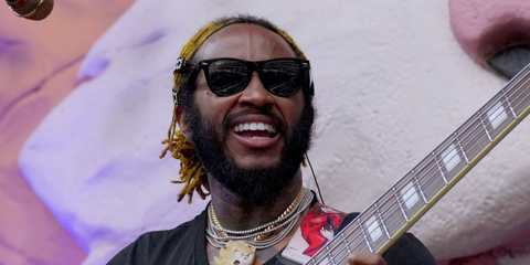 Singer-songwriter Thundercat was seen wearing black Ray-Ban Folding Wayfarer 4105 601/58 Polarised sunglasses onstage during Red Hot Chili Peppers concert at SoFi Stadium in July 2022.