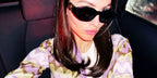 Thylane Blondeau was seen wearing the iconic black Versace 4361 GB1/87 Medusa Biggie Sunglasses to attend Sabrina Carpenter concert