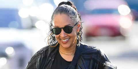 Television personality Tia Mowry was seen wearing black Ray-Ban RB 2180 601/71 round sunglasses. Shop online now on Pretavoir