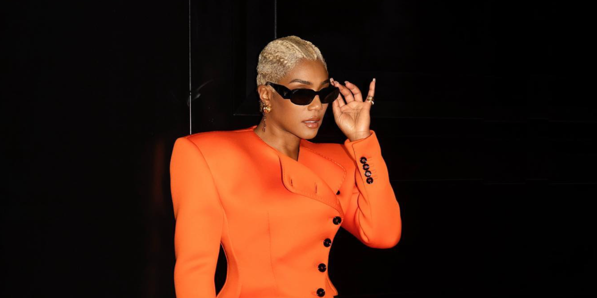American actress and comedian Tiffany Haddish was seen wearing black Prada PR 17WS 1AB5S0 Symbole Sunglasses in her Instagram post