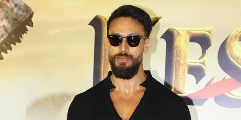 Bollywood actor Tiger Shroff was seen wearing textured black Ray-Ban Clubmaster RB 3016 1305/B1 half-rim sunglasses at the premiere of film 'Kesari Veer' in Mumbai, India, May 2025