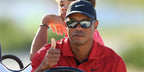 Tiger Woods is seen wearing Nike Brazen Boost FJ1975 010 sunglasses in a 2022 championship