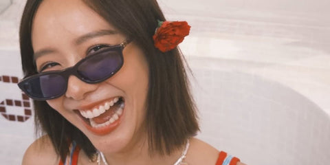 Thai actress Toey Jarinporn was seen wearing dark brown Miu Miu MU A06S 22C60O sunglasses with blue lenses in a social media post. Shop online now on Pretavoir