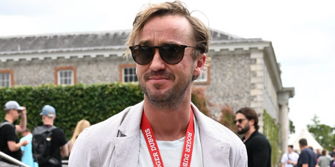 Tom Felton was seen wearing dark tortoiseshell Ray-Ban Erika RB 4171 710/T5 sunglasses with brown Polarised lenses to attend the 2024 Goodwood Festival of Speed in West Sussex