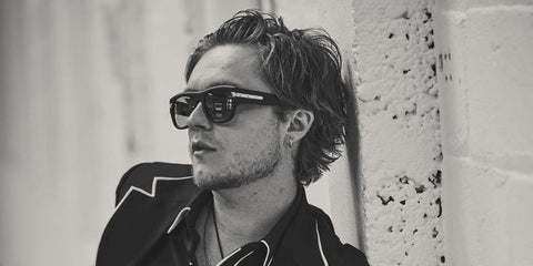 Actor Tom Glynn-Carney was seen wearing black Gucci GG1517S 001  sunglasses in an Esquire feature, June 2024.