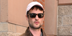 Tom Sturrdge was seen wearing tortoise Saint Laurent Sun SL 83 002 square sunglasses at the Telluride Film Festival, September 2026.