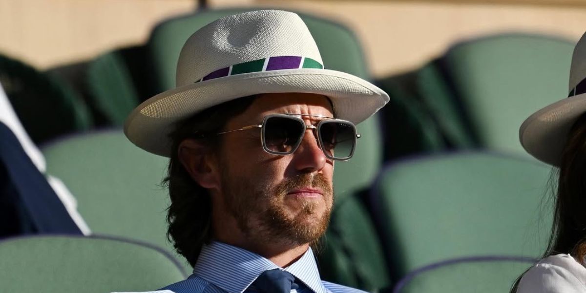 Professional golfer Tommy Fleetwood was seen wearing grey and gold Dita Flight .006 7806 H sunglasses with grey gradient lenses at the Wimbledon Tennis Championships 2023.