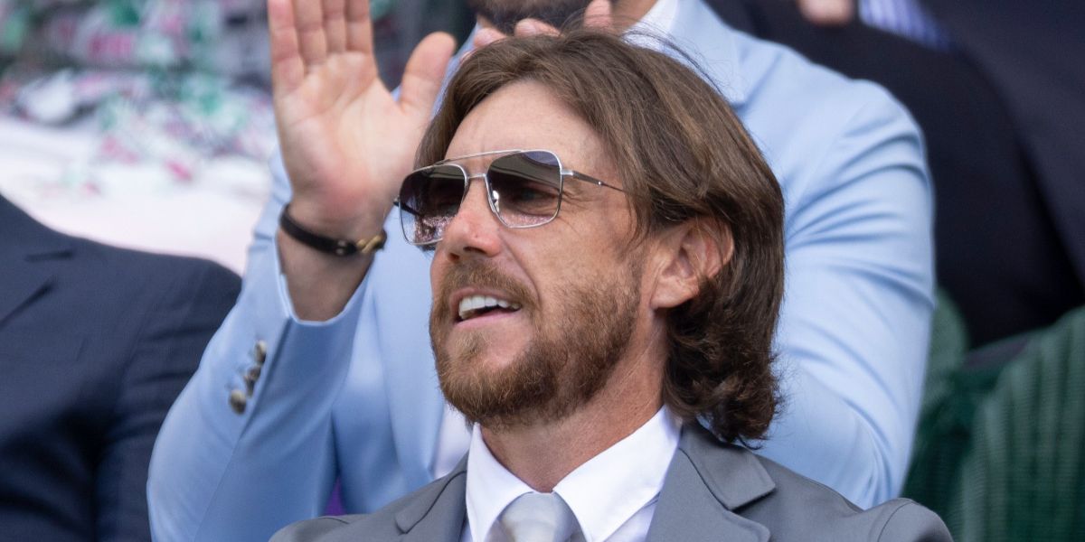 Professional golfer Tommy Fleetwood was seen wearing silver Dita Flight Seven DTS 111 01 sunglasses with grey gradient lenses at the Wimbledon Tennis Championships 2025.