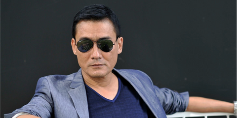 Hong Kong actor Tony Leung Ka-fai was seen wearing Ray-Ban Aviator RB 3025 L2823 Black/Green sunglasses at the Venice Film Festival 2012.