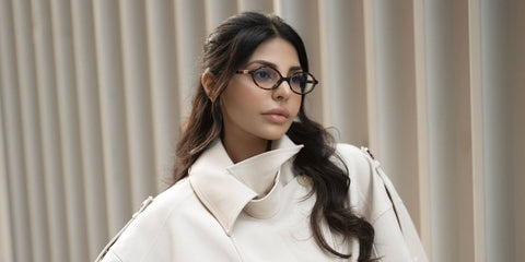 Dubai-based digital creator Tooba Waseem was seen wearing tortoiseshell Miu Miu MU 01XV VAU1O1 oval optical glasses in her Instagram post, November 2025.
