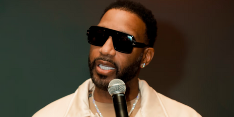 Former professional basketball player Tracy McGrady was seen wearing black Tom Ford Camden TF933 01A sunglasses.