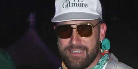 Travis Kelce at Coachella 2024 wearing Stella McCartney sunglasses and Happy Gilmore hat