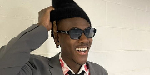 Footballer Trevoh Chalobah of the Chelsea FC was seen wearing black Prada PR 02ZS 1AB06T sunglasses.