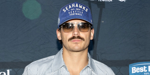 American country singer Tucker Wetmore was seen wearing gold Ray-Ban New Caravan RB 3636 001/51 sunglasses with brown gradient lenses at Guy Fieri's Flavortown Tailgate, February 2026.