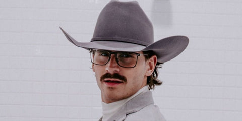 American country singer Tucker Wetmore was seen wearing black and gold Tom Ford TF5865-B 002 Blue Control optical glasses at the CMA Awards 2025 after party.