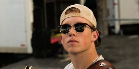 Musician and guitarist Ty Myers was seen wearing the iconic black and gold Ray-Ban Clubmaster RB 3016 901/58 Polarised sunglasses in his social media post, December 2024.