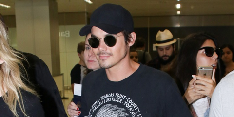 Actor Tyler Blackburn was seen wearing gold Ray-Ban Round Metal 3447 001 sunglasses in Brazil.