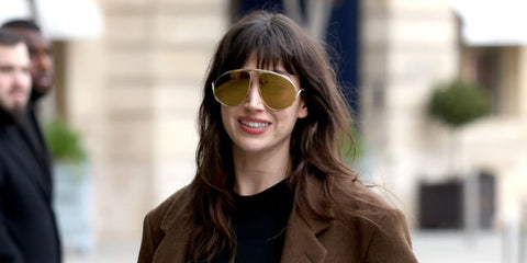 Spanish actress Ursula Corbero was seen wearing gold Loewe Signature LW40180U 30G sunglasses during Paris Fashion Week season Fall/Winter 2025. Shop online now on Pretavoir