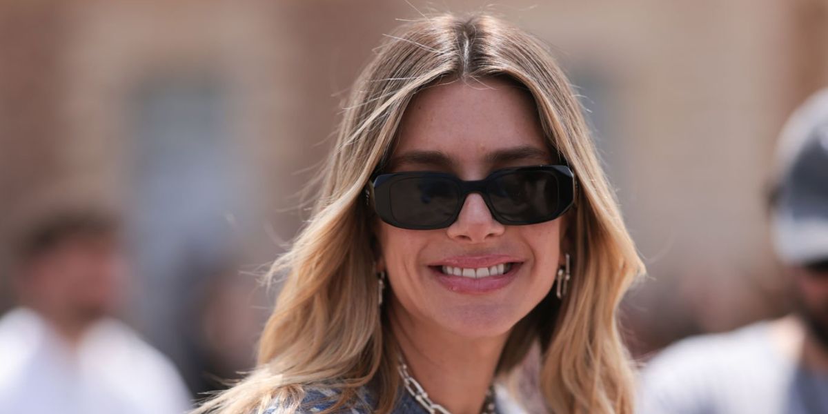 Valentina Ferrer, Argentine model and girlfriend of J Balvin, was seen wearing black Prada PR 17WS 1AB5S0 Symbole Sunglasses at the Dior Menswear Spring/Summer 2024 fashion show during Paris Men's Fashion Week. Shop online now on Pretavoir