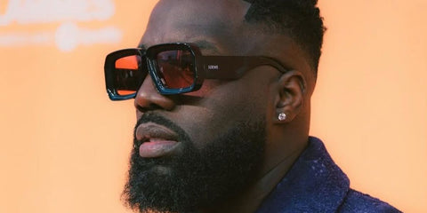 Ferench rapper and singer was seen wearing black Loewe x Paula's Ibiza LW40064U 01Y sunglasses with red lenses in his Instagram post, May 2024