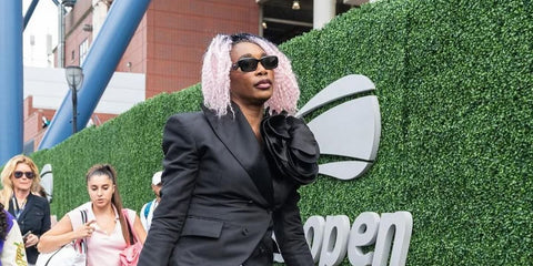 Venus Williams is seen wearing Prada PR 27ZS 16K08Z sunglasses to the US Open