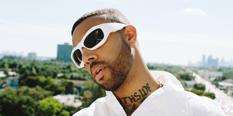 American rapper Vic Mensa was seen wearing white Bottega Veneta BV1086S 004 sunglasses in a Pause Magazine feature, July 2022.