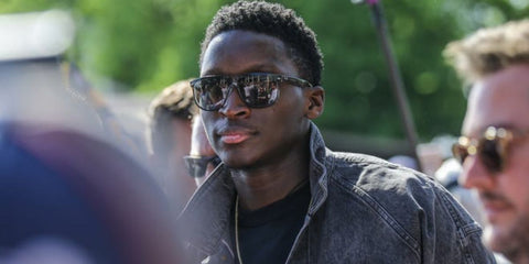 Basketball player Victor Oladipo was seen wearing black Ray-Ban Boyfriend RB 4147 601/87 sunglasses