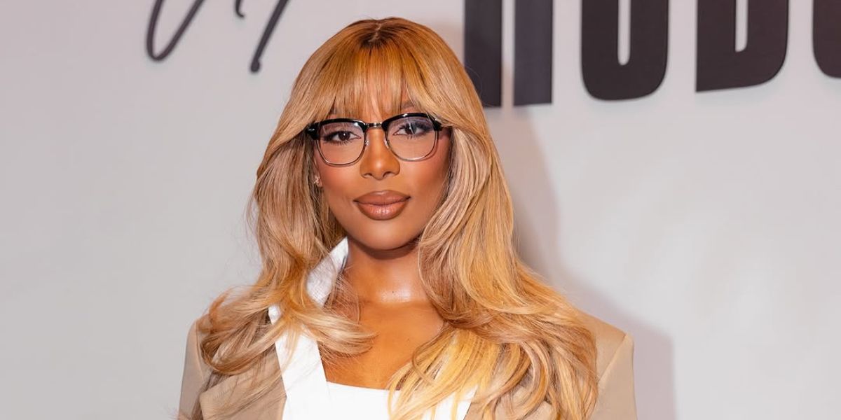 Victoria Monet was seen wearing Ray-Ban Clubmaster Optical RB 5154 2000 black half-rim optical glasses in The Jennifer Hudson Show
