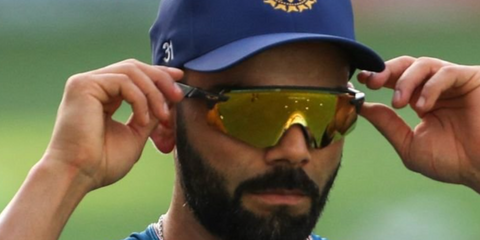 Indian cricket player Virat Kohli wears Oakley Encoder sunglasses