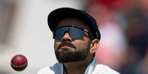 Indian cricket player Virat Kohli wearing Oakley Hydra sunglasses on the field
