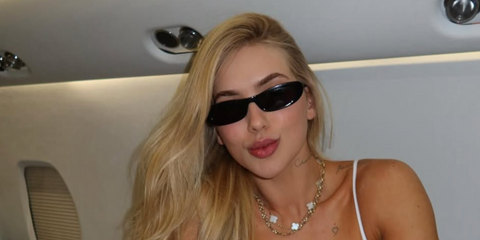 Brazilian television host Virginia Fonseca was seen wearing black Saint Laurent Sun SL 557 Shade 001 sunglasses in her Instagram post, February 2026.