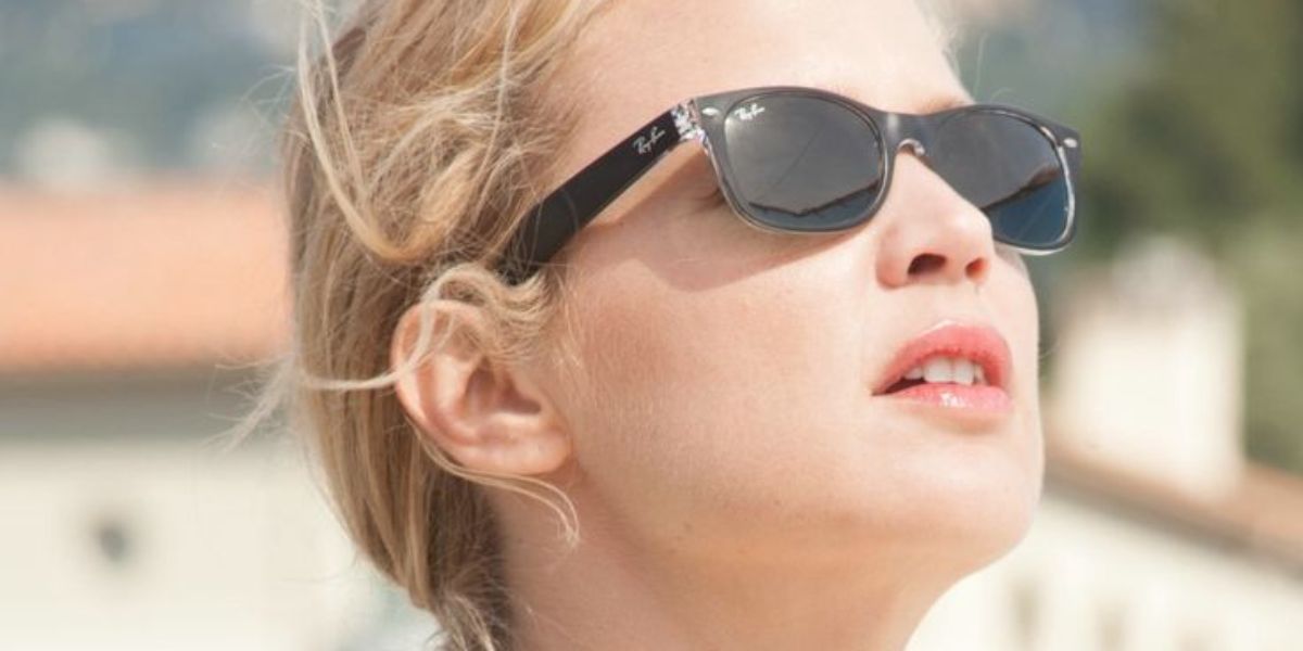Belgian-French actress Virginie Efira was seen wearing black and transparent Ray-Ban New Wayfarer 2132 6052 sunglasses in 2016 movie Up For Love