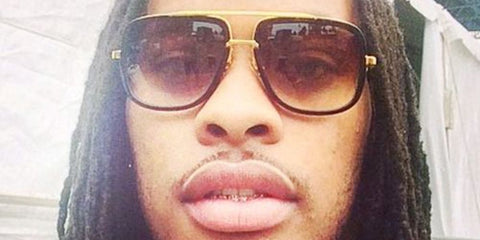 Rapper Waka Flocka Flame was seen wearing Dita Mach One DRX 2030 B - Gold & Black sunglasses. Shop online now on Pretavoir