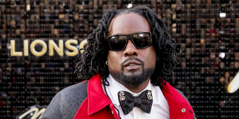 Rapper Wale was seen wearing black Saint Laurent Sun SL 832 001 sunglasses at the Los Angeles premiere of Michael Jackson biopic "Michael" in April 2026.