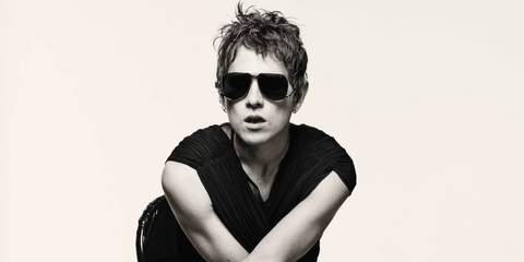 Walt Klink was seen wearing silver Saint Laurent Sun SL 690 Dust 002 aviator sunglasses in a Behind The Blinds Magazine feature. Shop online now on Pretavoir