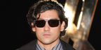 Will Sharpe wore silver Saint Laurent SL 750 003 sunglasses at the Saint Laurent Spring Summer 2027 show during Paris Fashion Week.