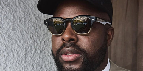 Winston Duke wears Oliver Peoples Maysen OV5521SU 1748/53 sunglasses in his Instagram post