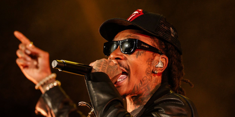 Wiz Khalifa was seen wearing black Saint Laurent Sun SL 740 005 sunglasses onstage at the 420 Eve On The Rocks in Colorado April 2026.