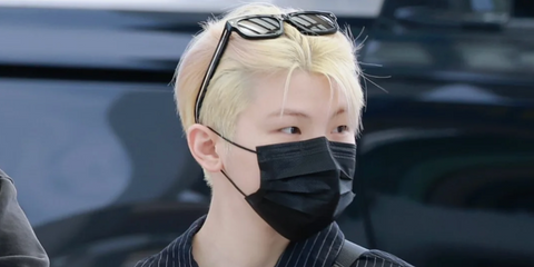 Woozi of K-Pop group SEVENTEN was seen wearing black Prada PR B11S 16K731 sunglasses at Incheon Airport, April 2025. Shop online now on Pretavoir