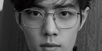 Xiao Zhan is seen wearing gold Gucci GG0681O 001 square glasses in a fashion editorial page of Vogue Me