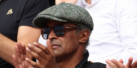 French tennis legend Yannick Noah was seen wearing tortoiseshell Persol Jean 3310S 96/56 sunglasses with blue lenses at the French Open 2023. Shop online now on Pretavoir