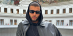 Model and former boxer Younes Bendjima was seen wearing black Prada PR 27ZS 16K08Z sunglasses in his Instagram post, November 2023.