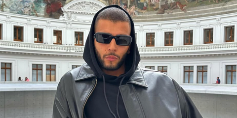 Model and former boxer Younes Bendjima was seen wearing black Prada PR 27ZS 16K08Z sunglasses in his Instagram post, November 2023.