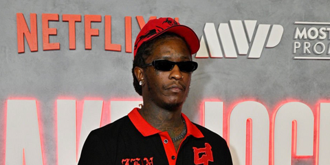 Rapper Young Thug was seen wearing black Saint Laurent Sun SL 557 Shade 001 sunglasses at  the Jake Paul vs Anthony Joshua Netflix Live Event in Miami, December 2025.