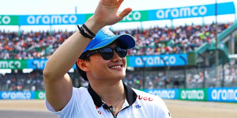 Yuki Tsunoda wears Oliver Peoples Cary Grant Sun OV5413SU 1492/3R Polarised sunglasses at Suzuka Circuit in Jspsn