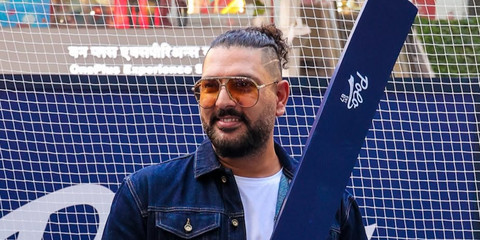 Indian cricketer Yuvraj Singh was seen wearing gold Tom Ford Xavier TF1060 30F aviator sunglasses with brown lenses at a Ralph Lauren Fragrances event in October 2024.